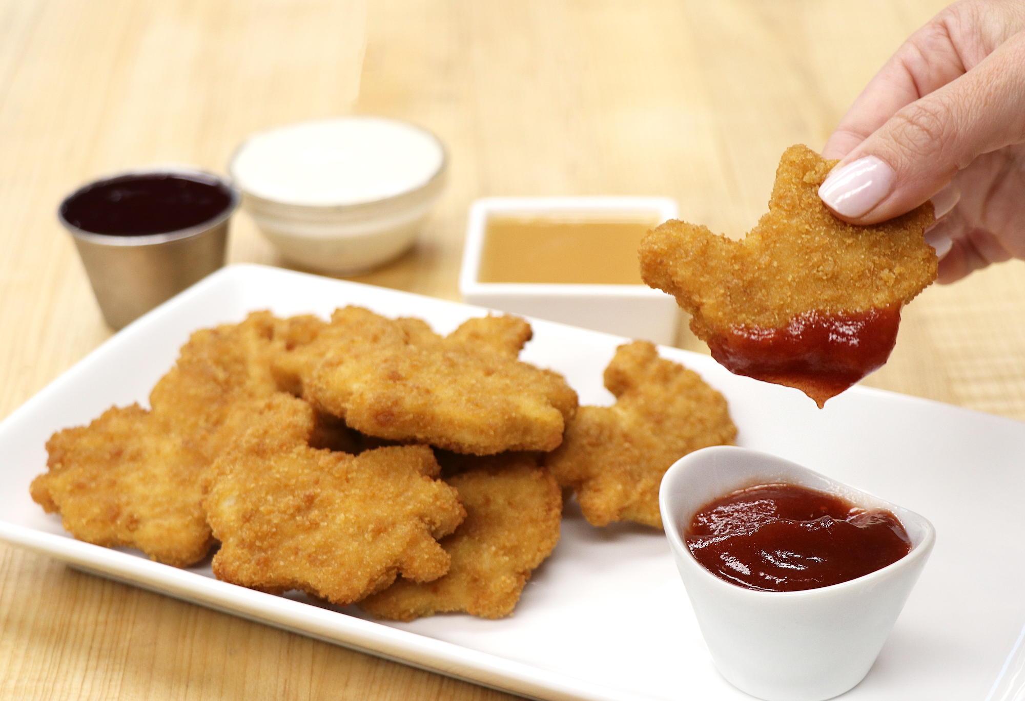 Thanksgiving Chicken Nuggets Thanksgiving chicken nuggets dipping in sauce